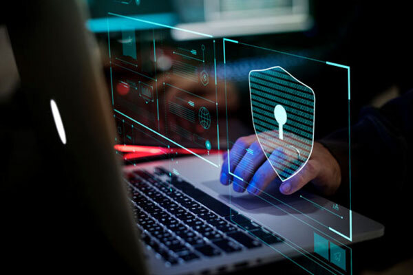 A photo of a hand typing on a keyboard, used for 5 Top Security Best Practices for Protecting Government Records