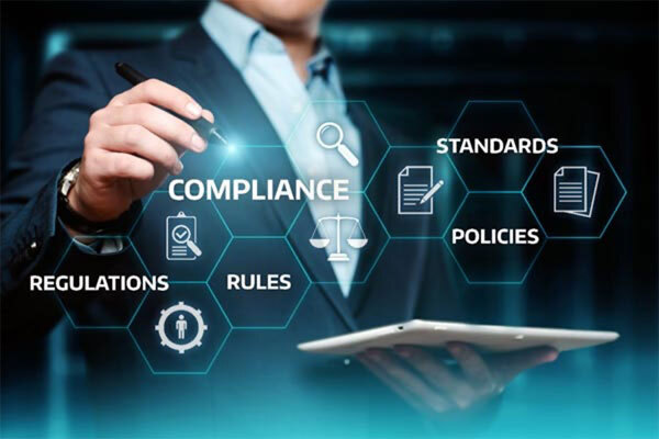 Image of a man interacting with a digital interface with icons for compliance, standards, regulations, etc